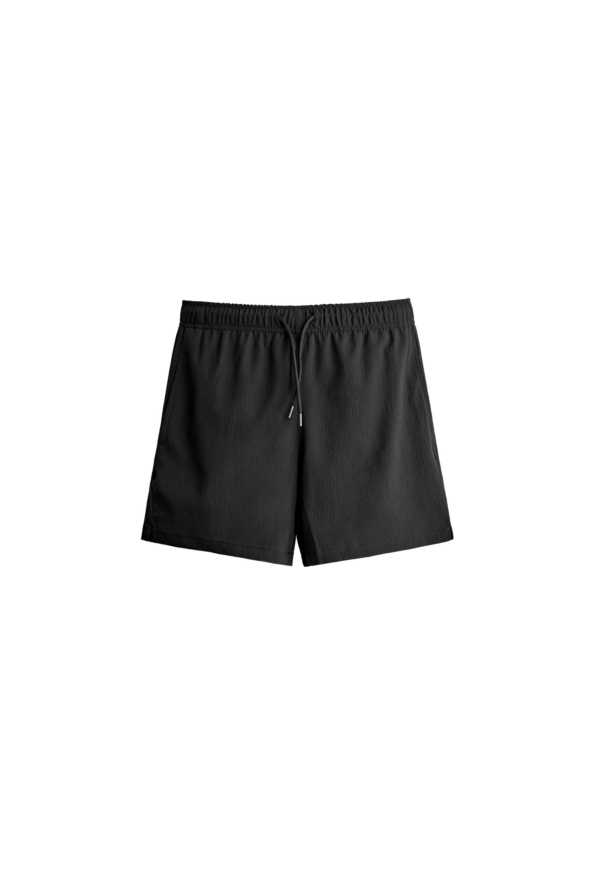 ПЛАВКИ СРЕДНЕЙ ДЛИНЫ С НЕРАВНОМЕРНОЙ ТЕКСТУРОЙ — ZARA