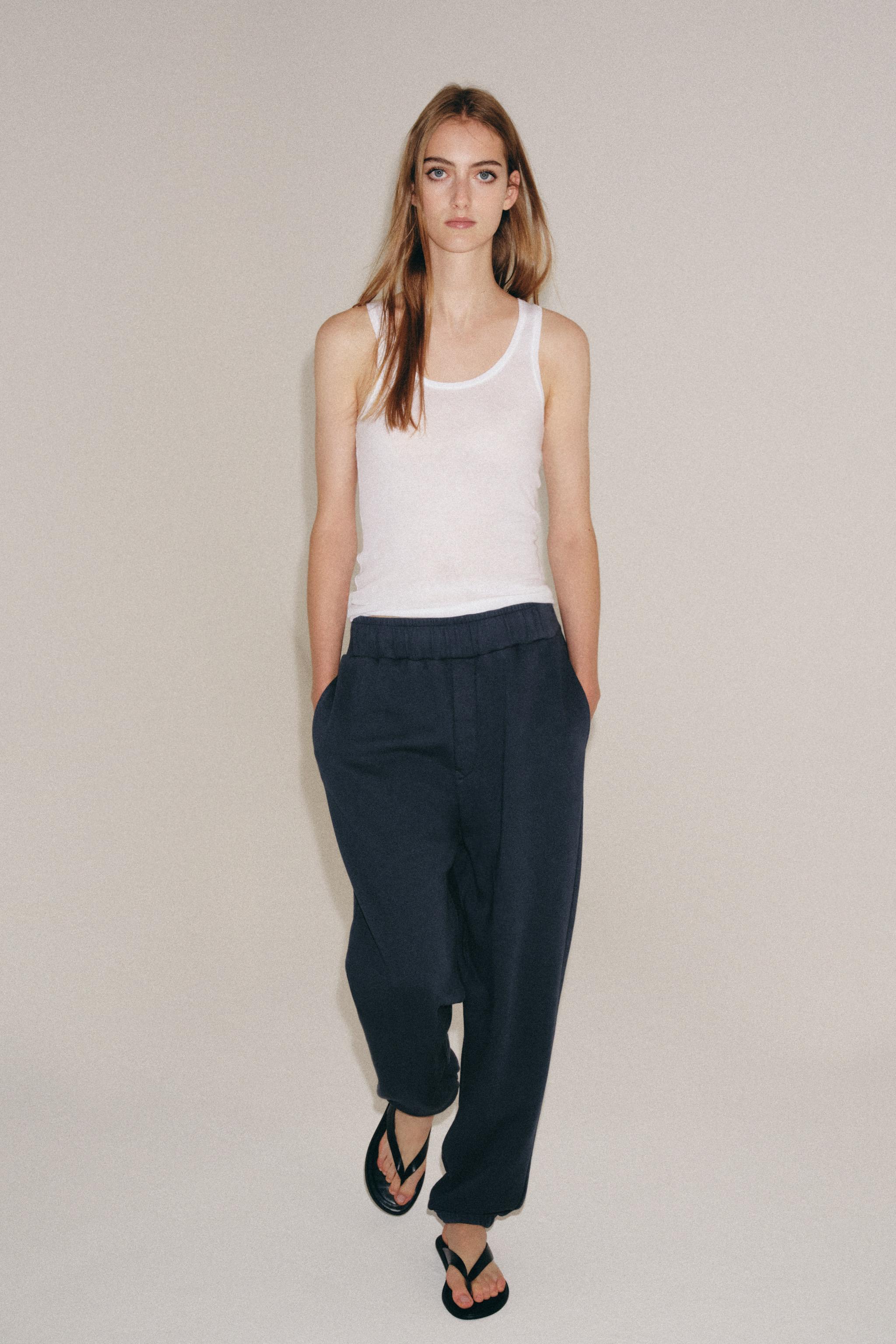 Брюки с эффектом потертости — ZARA